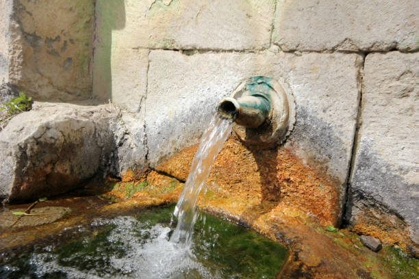 istock Stone fountain mountain water 696864904