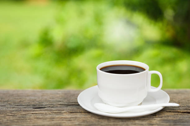 istock Hot coffee and a garden. 696865868