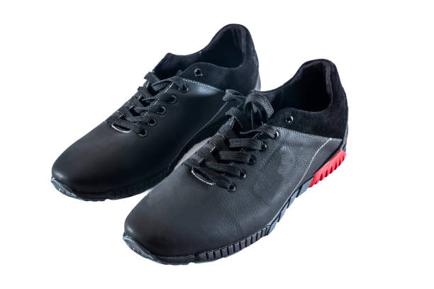 istock male black leather sneakers isolated on white 696872562
