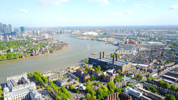 Aerial drone photo of Greenwich park and University with views to Canary Wharf on a spring morning, London, United Kingdom stock photo
