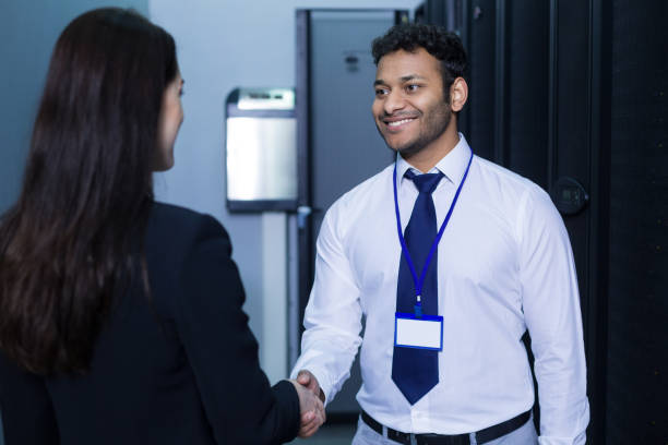 istock Delighted positive man shaking his colleagues hand 696882002