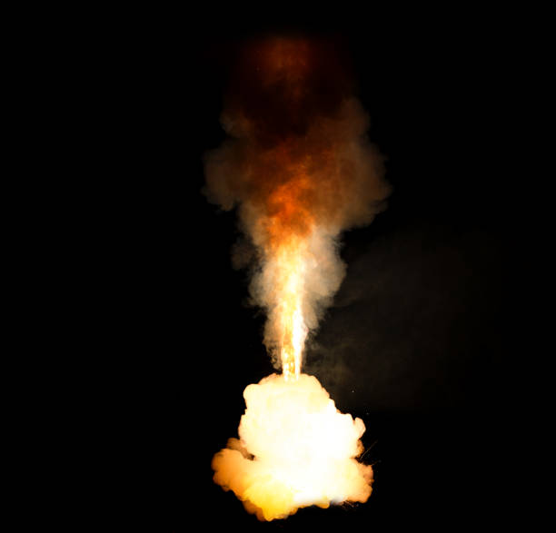 istock Huge, extremely hot explosion with sparks and hot smoke, against black background 696885496