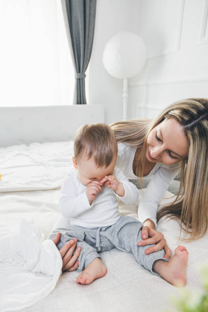 istock Mother comforting her crying child 696886062