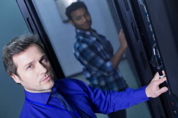 istock Serious confident man looking at you 696886140
