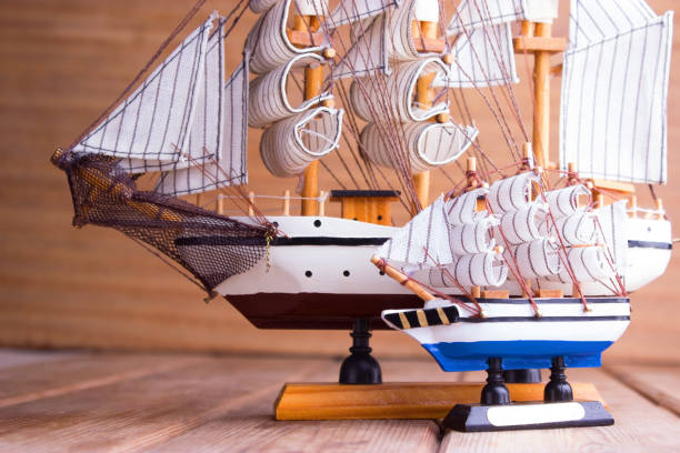 istock model of ships on the wooden table 696886252
