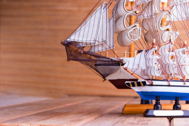 istock model of ships on the wooden table 696886256