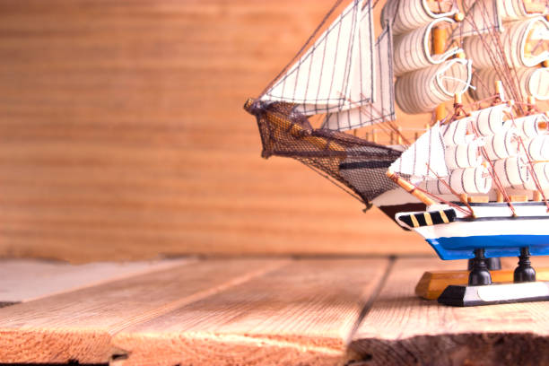 istock model of ships on the wooden table 696886260
