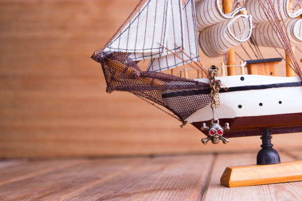 istock model of ships on the wooden table 696886266