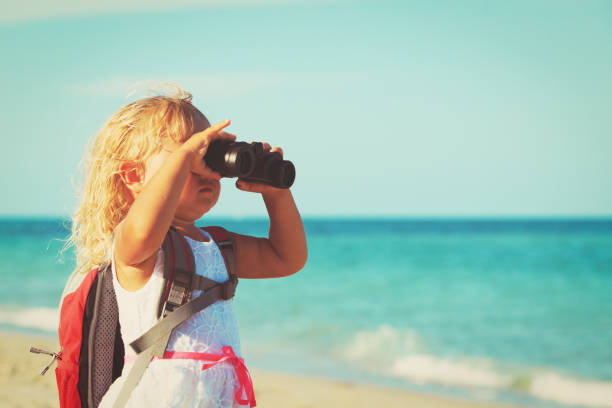 istock little girl travel on beach 696889766