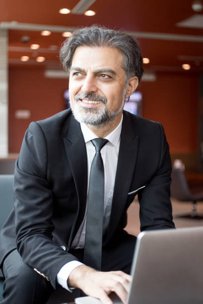 istock Dreamy business coach working on new webinar 696889806