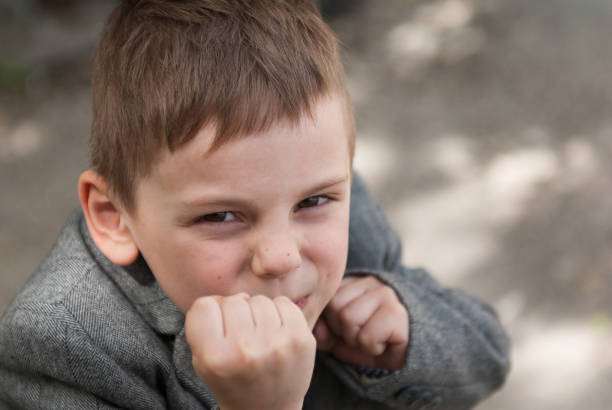 istock funny little boy in boxing rack 696900756
