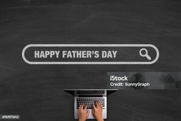 Happy Fathers Day Concept With Laptop On Blackboard Stock Photo - Download Image Now