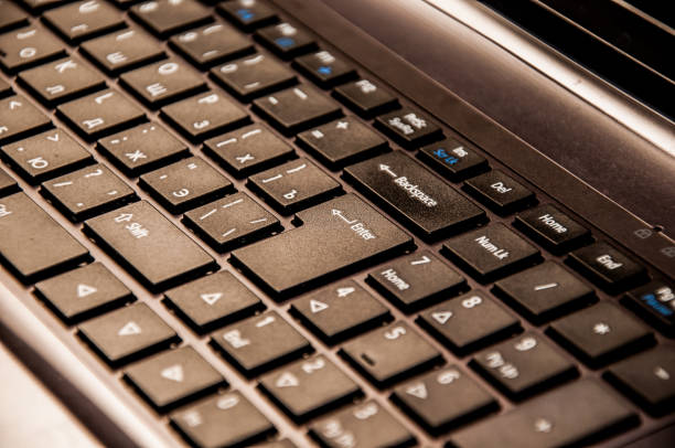 istock A closeup of a notebook keyboard number panel with Enter key in focus 696911796