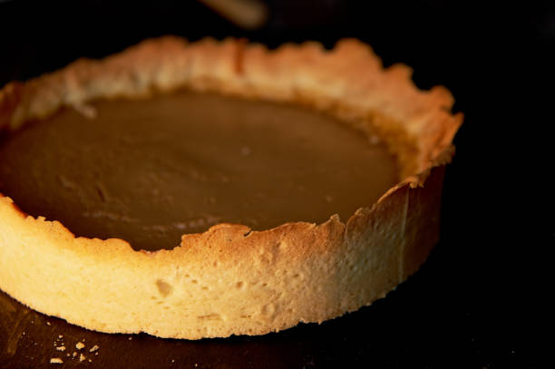 istock Blank for cheesecake.The layer of crushed biscuits 696915600