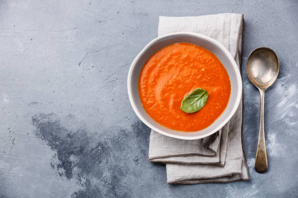 istock Gazpacho soup with green basil 696916682