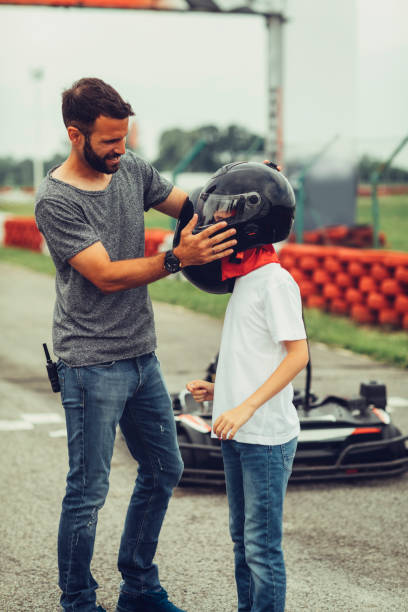 istock Father and son go-Karts 696917916