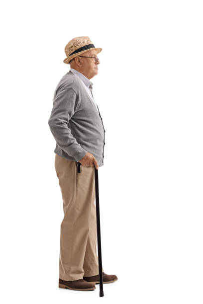 istock Senior with a cane waiting in line 696919458