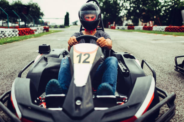 istock Mid adult man go-Karts 696920944