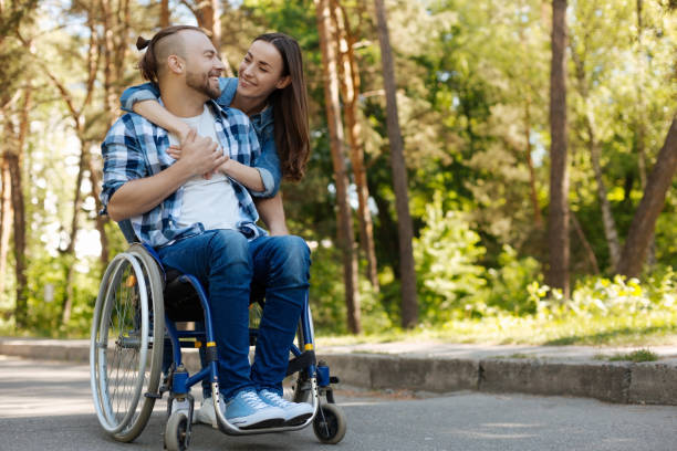 istock Delighted pair of lovers going for a walk in park 696931270