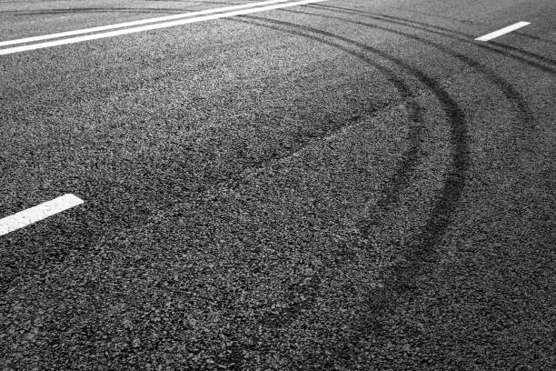 istock Asphalt road with marking lines white stripes 696932188