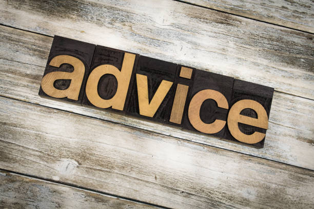 istock Advice Letterpress Word on Wooden Background 696935120