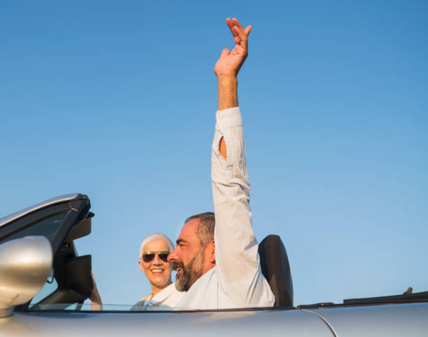 istock Mature couple at car 696939180