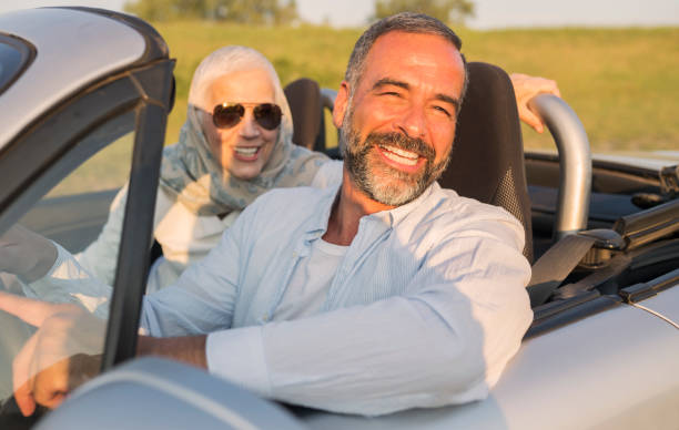 istock Mature couple at car 696939564
