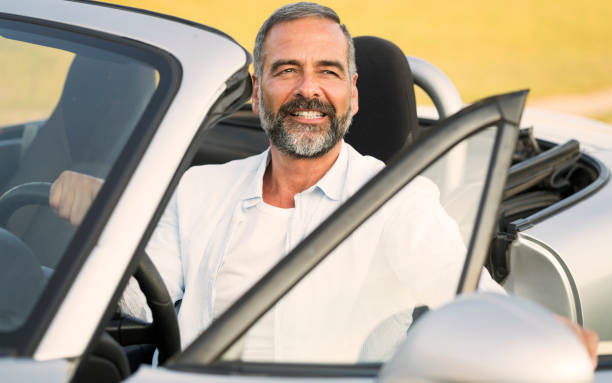 istock Mature man at car 696939568
