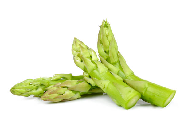 istock Asparagus isolated on the white background 696947500