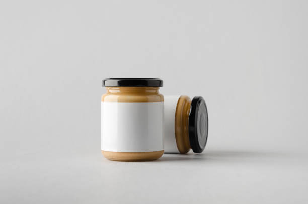 istock Peanut / Almond / Nut Butter Jar Mock-Up - Two Jars. Blank Label 696955266