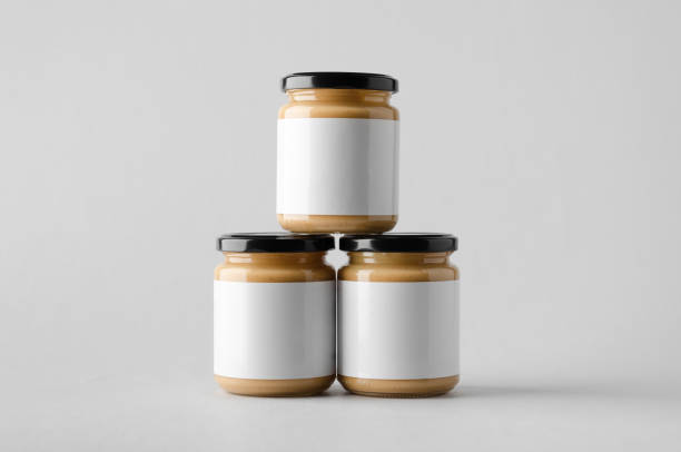 istock Peanut / Almond / Nut Butter Jar Mock-Up - Three Jars. Blank Label 696955320