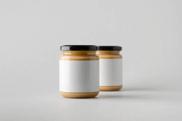 istock Peanut / Almond / Nut Butter Jar Mock-Up - Two Jars. Blank Label 696955402