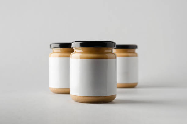 istock Peanut / Almond / Nut Butter Jar Mock-Up - Three Jars. Blank Label 696955470