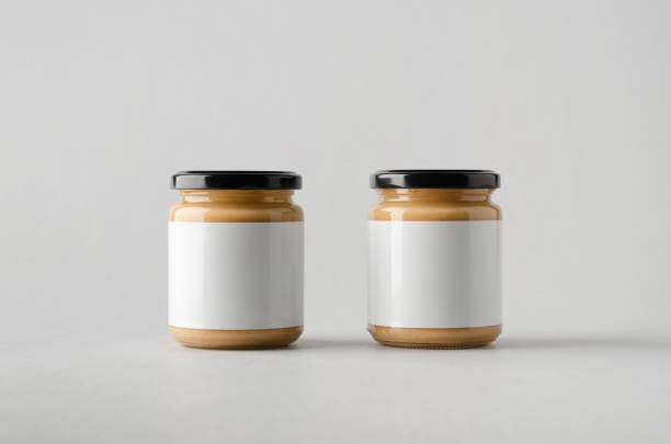 istock Peanut / Almond / Nut Butter Jar Mock-Up - Two Jars. Blank Label 696955544