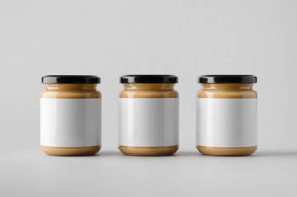 istock Peanut / Almond / Nut Butter Jar Mock-Up - Three Jars. Blank Label 696955668