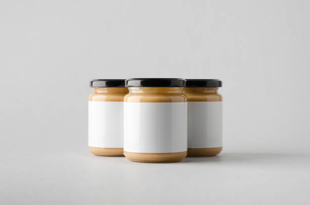istock Peanut / Almond / Nut Butter Jar Mock-Up - Three Jars. Blank Label 696955704