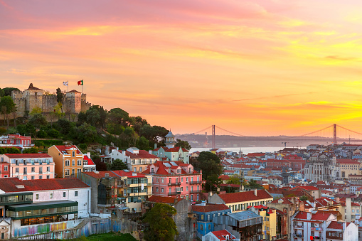 The historical centre of Lisbon, Tagus River and 25 de Abril Bridge at scenic sunset, Lisbon, Portugal