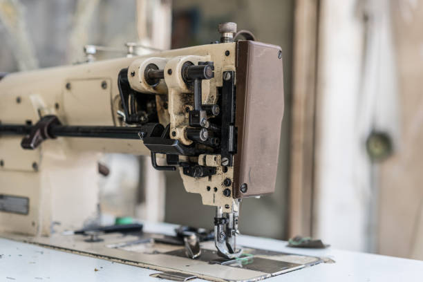 istock Sewing machine for the sewing factory 696965592