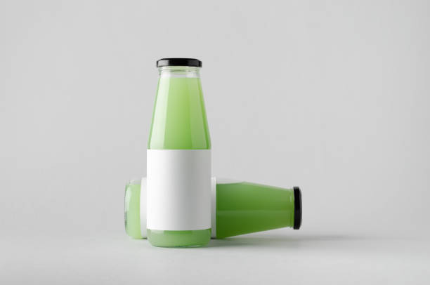 istock Juice Bottle Mock-Up - Two Bottles. Blank Label 696966158