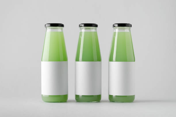 istock Juice Bottle Mock-Up - Three Bottles. Blank Label 696967650