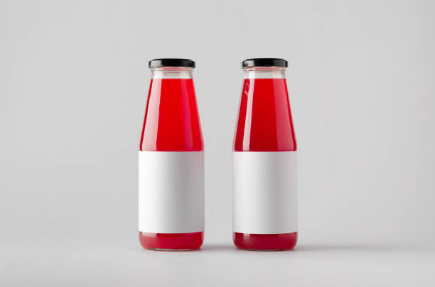 istock Juice Bottle Mock-Up - Two Bottles. Blank Label 696970490