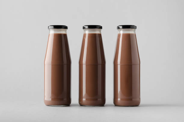 istock Chocolate Milk Bottle Mock-Up - Three Bottles 696971434