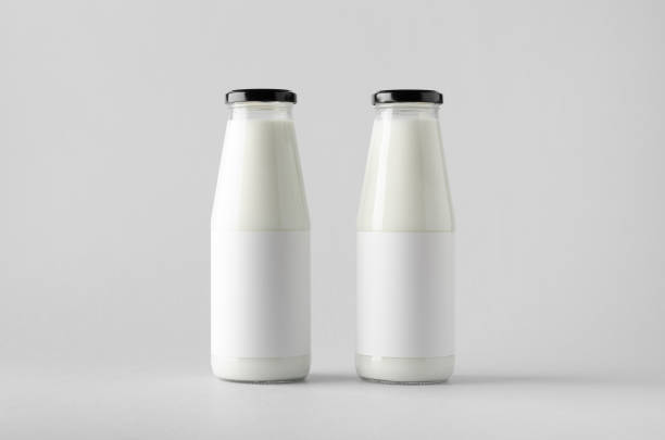 istock Milk Bottle Mock-Up - Two Bottles. Blank Label 696973598