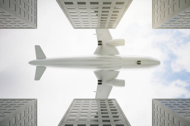 istock Bottom view of aiplane in dull sky 696973628