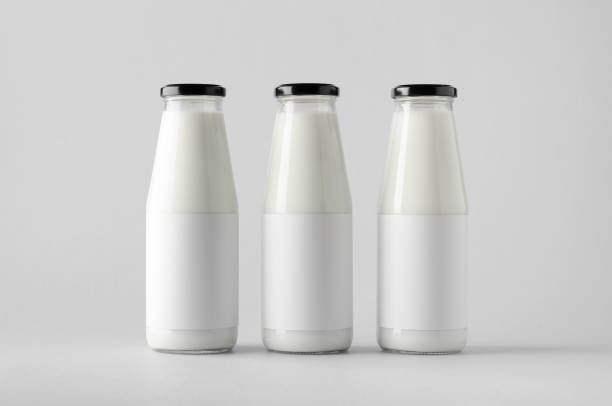 istock Milk Bottle Mock-Up - Three Bottles. Blank Label 696974004