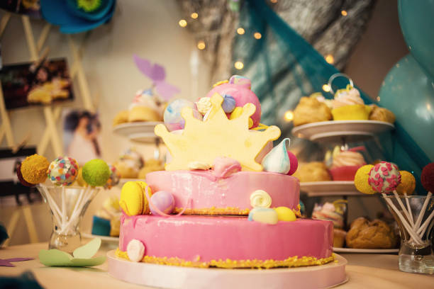 Candy Bar. Delicious sweet buffet with cupcakes. Sweet holiday buffet with cupcakes and other desserts.Table with sweets, candies, dessert,happy birthday concept