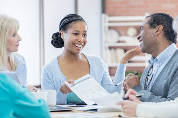 istock Financial advisor meets with senior adults 696977634