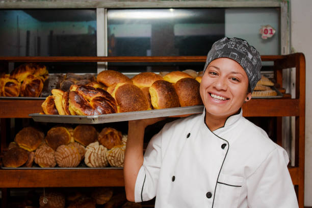 baker Baker at a local bakery mexican ethnicity stock pictures, royalty-free photos & images