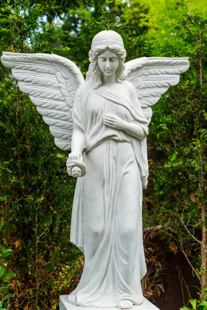 istock Statue of an Angel on Graveyard 696978386
