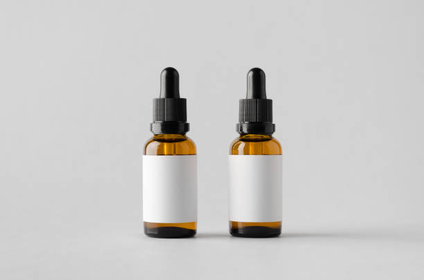 istock Dropper Bottle Mock-Up - Two Bottles. Blank Label 696978674
